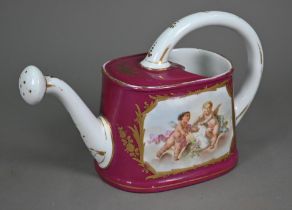 A porcelain watering-can with floral-painted reserves on a puce and gilt ground, 18 cm high x 31