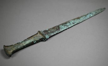 A Bronze Age (probably Iran) dagger, the tapering two-edge blade engraved with cruciform symbols and