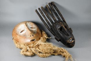 A 20th century African Lukwakongo 'passport' mask, Lega Bwani society, Dominican Republic of