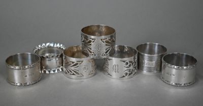 Seven various silver napkin rings, 7.7oz