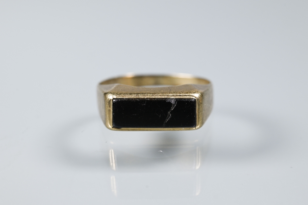 A 9ct yellow gold bar brooch set with central citrine, onyx set signet ring and single unmarked - Image 4 of 5