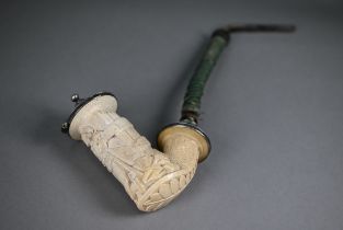 An antique German Meerschaum pipe, the bowl with ep mounts carved with a farmer smoking, 14 cm