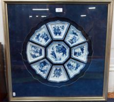 A Chinese blue and white sweetmeat or rice table set comprising eight interlocking dishes