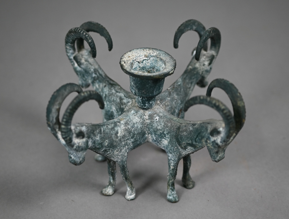 A verdigris-patinated candlestick supported by four goats, in the antique manner, 11 cm high - Image 4 of 4
