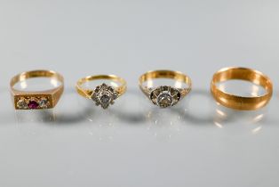 Four various 18ct yellow gold rings, two set with small diamonds, one red and white paste and one