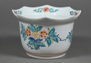 An 18th century Chantilly porcelain cache-pot with polychrome enamel floral decoration in the