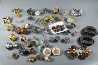 A collection of vintage buttons and buckles including Georgian cut steel shoe buckle pair, enamelled
