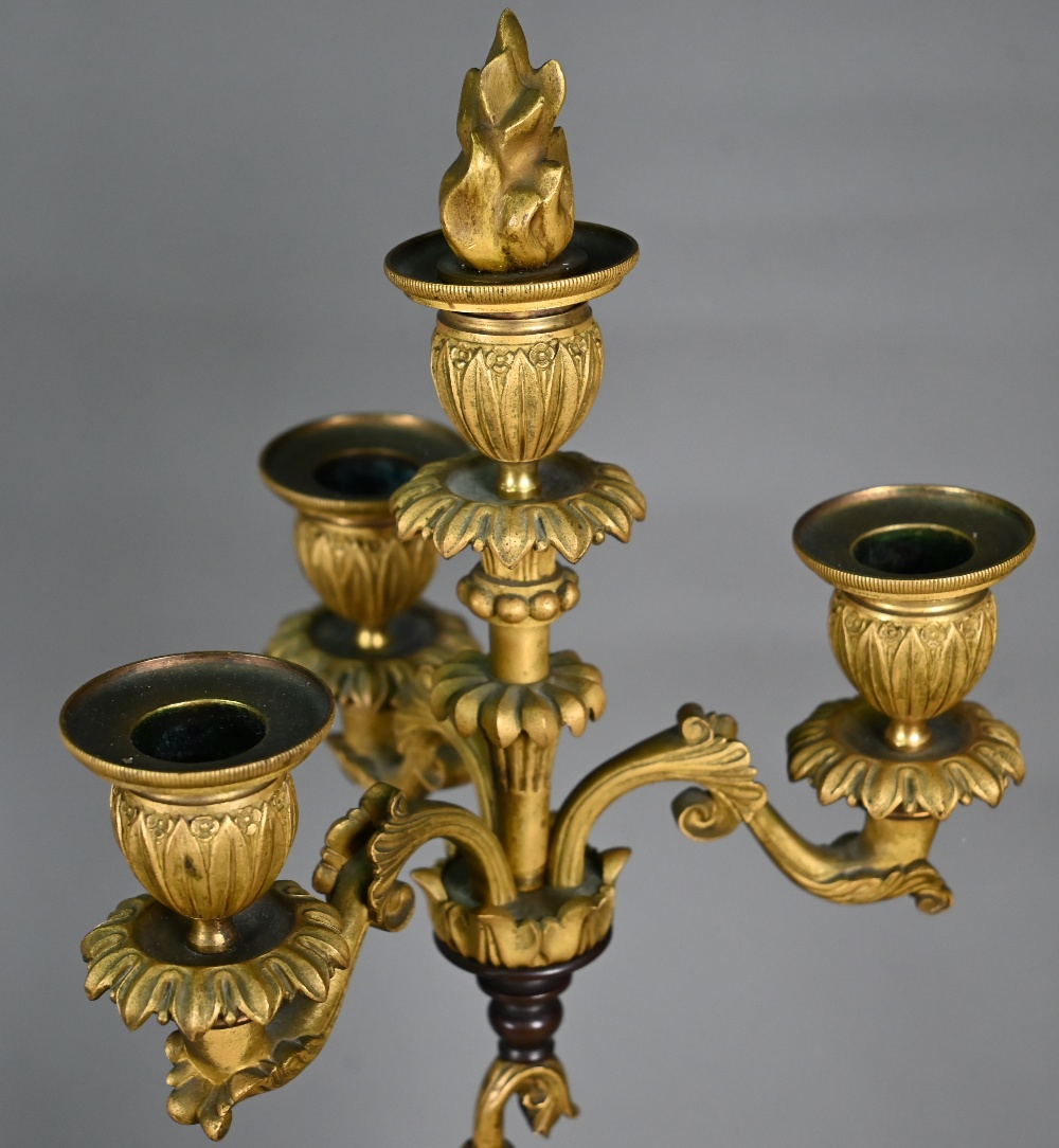 A pair of continental bronzed and ormolu four-sconce candelabra with figural pillars, 59 cm high o/a - Image 4 of 4