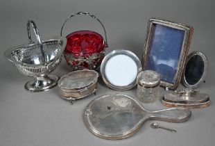 A silver ring-box, nail-buffer, hand-mirror, toilet jar and three small photograph frames, to/w a