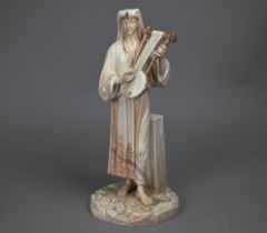 A Victorian Royal Worcester china figure, Egyptian musician, date mark for 1886, 32 cm