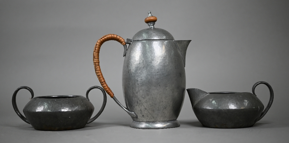 A Liberty & Co planished pewter ovoid coffee pot/hot water jug with wicker-bound handle, no 01455 - Image 2 of 4