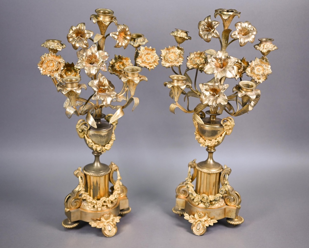 A pair of late 19th century gilt metal five light floral mantel candelabra, 50 cm h (2)