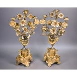 A pair of late 19th century gilt metal five light floral mantel candelabra, 50 cm h (2)