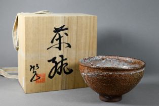 Tarimuto Kokyo (b.1947) A Japanese stoneware chawan teabowl with Shigaraki style blue/brown