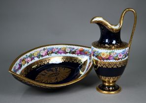 An early 20th century Sevres porcelain baluster jug with matching elliptical bowl, finely painted