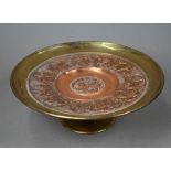 A 19th century cast brass tazza, impressed with relief medallions depicting medieval continental