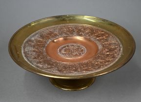 A 19th century cast brass tazza, impressed with relief medallions depicting medieval continental