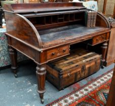 A William VI mahogany cylinder top desk, the 3/4 gallery top over a leather top slide and stationary