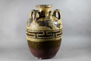 A Chinese olive glazed stoneware 'Martaban' wine jar in the Tang/Five Dynasties style, with short