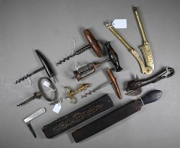 Six antique and later corkscrews to/w an Indian brass sugar-crusher, a 'Bully' can-opener, a '