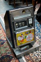 A vintage Aristocrat Olympic 'Carousel one-armed bandit' (fruit machine