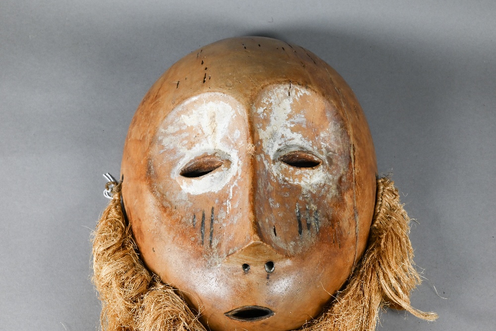 A 20th century African Lukwakongo 'passport' mask, Lega Bwani society, Dominican Republic of - Image 9 of 12