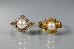 Two pearl set rings, one unmarked yellow metal in scroll setting, size N (shank distorted), the