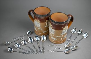 An Edwardian pair of Royal Doulton stoneware pint beer-mugs with silver rims, Mappin & Webb,