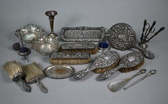 Two silver pin-dishes, various silver-backed brushes, manicure set on stand, hatpin stands (one ep),