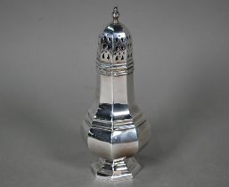 An octagonal silver baluster sugar caster, R.E. Porter, Birmingham 1982, 4.9oz, 17cm high