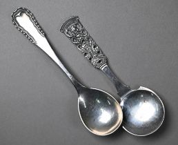 A Georg Jensen silver Viking pattern preserve spoon, London import 1930, to/w a Norwegian .830 grade