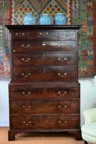 A George III mahogany chest on chest, the dentil moulded cornice over two short and three long