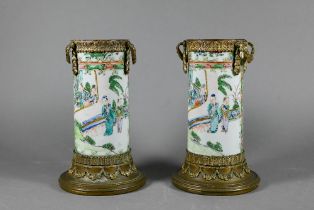 A pair or 19th century Chinese Canton famille rose cylindrical vases with European gilt metal