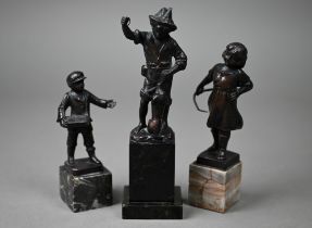 Three small bronze figures of children on marble bases, 17-11.5 cm