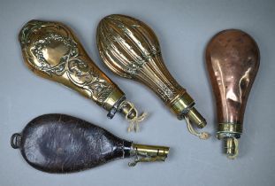 Two 19th century ornate copper and brass powder/shot flasks to/w a plain example and a leather