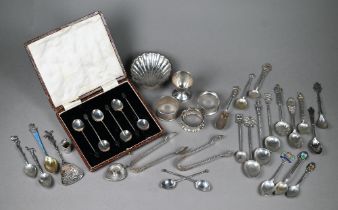 Six silver coffee spoons with bean finials and various other silver spoons, tongs, napkin rings