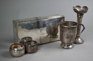 A silver cigarette box, Sheffield 1919, to/w a Christening mug, two napkin rings, a weighted vase-