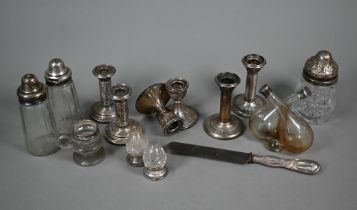An Edwardian glass oil and vinegar double-bottle with silver tops, Birmingham 1904, to/w three pairs