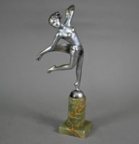 An Art Deco silver-patinated figure of a female nude dancer, after Josef Lorenzl (signed), on onyx
