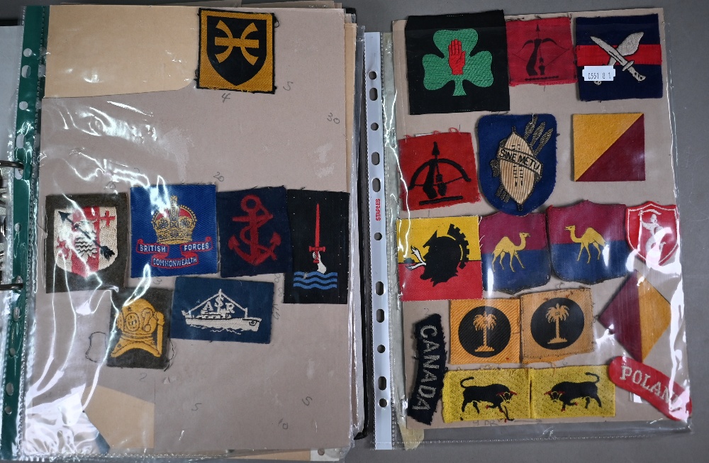 Two folders of British military WWII and other cloth, patch, shoulder titles and other insignia, - Image 2 of 3