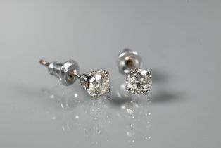 A pair of diamond stud earrings for pierced ears, each brilliant cut claw set diamond approx 0.4