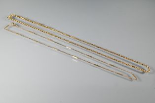 A 9ct yellow gold necklace formed of two differing belcher chains,  26 cm long to/w fancy link