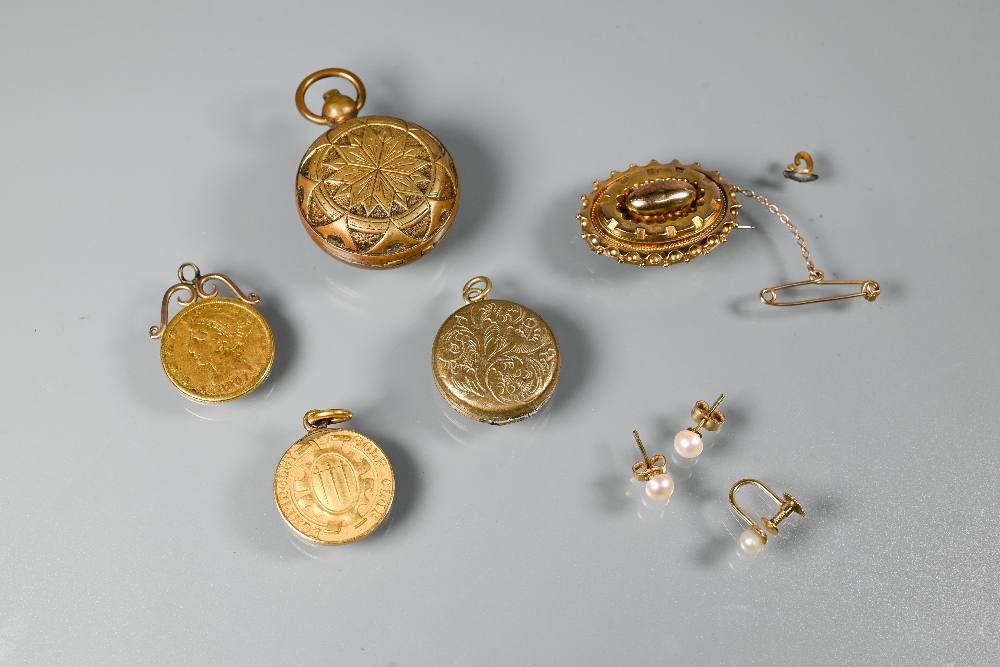 An 18ct yellow gold medal for Headingly Golf Club, 9.3g; a 1907 US dollar with pendant mount, a