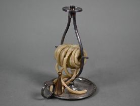 An early 19th Century silver plated wax-jack of open frame design, with conical snuffer, on circular