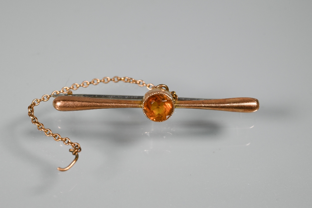 A 9ct yellow gold bar brooch set with central citrine, onyx set signet ring and single unmarked - Image 3 of 5