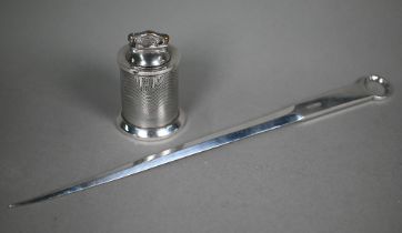 An Art Deco engine-turned silver table cigarette lighter of cylindrical form, Mappin & Webb,