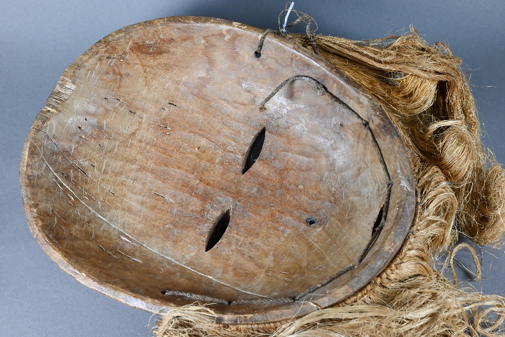 A 20th century African Lukwakongo 'passport' mask, Lega Bwani society, Dominican Republic of - Image 11 of 12