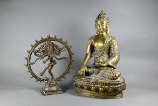 A 20th century Nepalese gilt-metal figure of Shakyamuni Buddha, 32 cm high to/w a 20th century