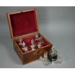 A 19th century boxwood and walnut liqueur bottle case (made up), the interior containing ten near-