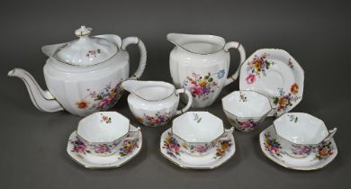 A Royal Crown Derby china 'Derby Posies' tea pot to/w two jugs and four cups and saucers